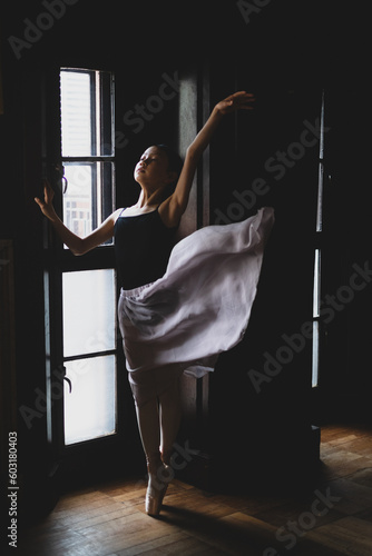 teenage dancer posing in studio