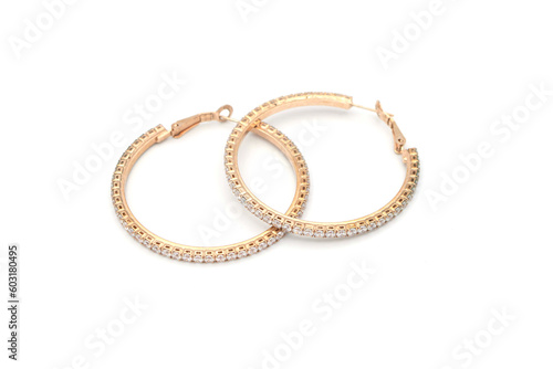 Elegant earrings, a pair of luxury earrings on white isolated background. Accessory earrings for women.