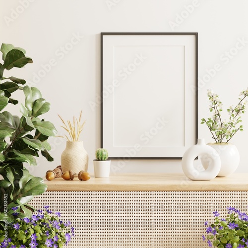 Poster mockup with vertical black frame in white wall interior background photo