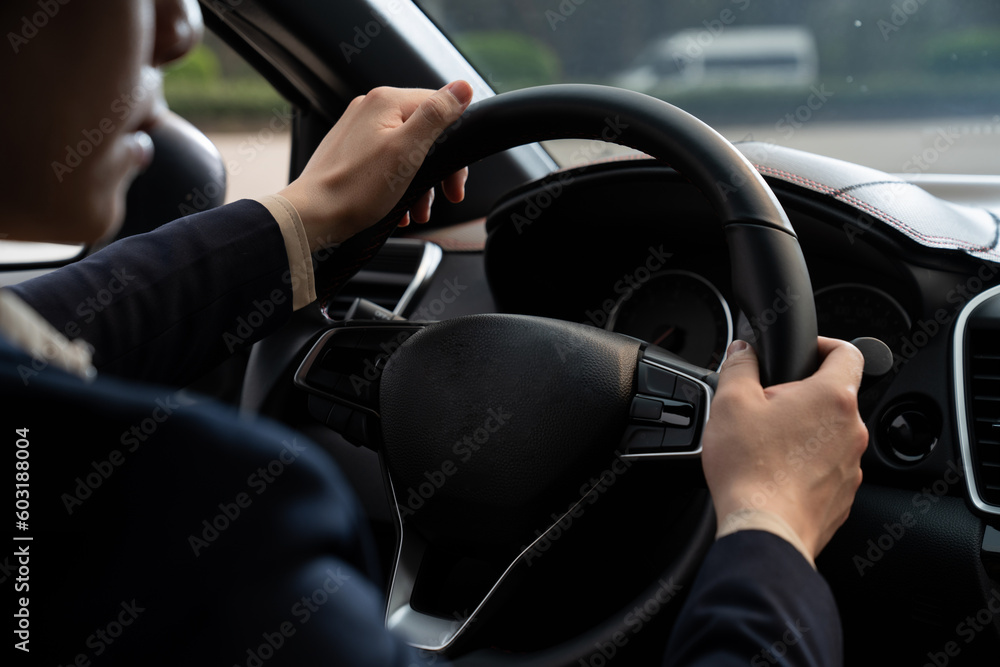 Young Asian business man with car