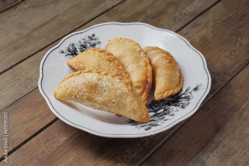 Traditional Curry Puff or Malay people called Karipap filled with potato filling