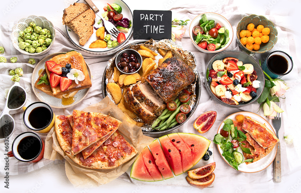 Family dinner or lunch. Many dishes on the table. Top view Family dinner or lunch. Many dishes on the table. Top view