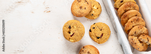 Fényképezés National Cookie Day with yummy freshly chocolate chip cookies on a white background