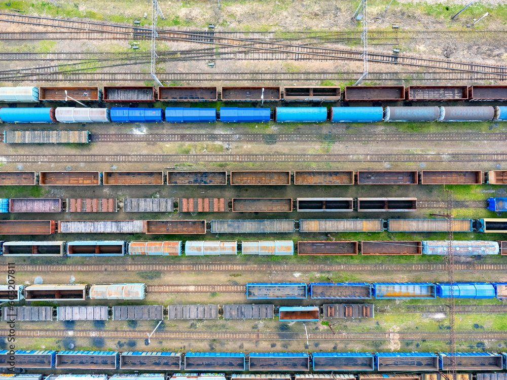 Aerial view landscape. View of trains, railroad tracks, cars, cargo. Photo from a drone. Coal transportation.