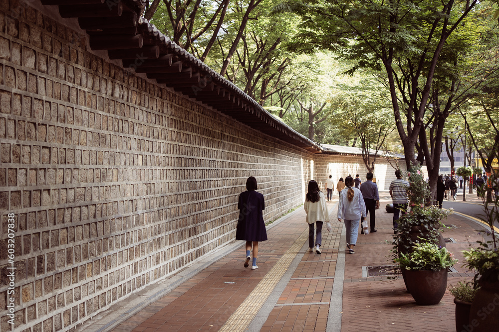 Korean style wall and roof in Deoksugung stone wall road in Seoul, South Korea.