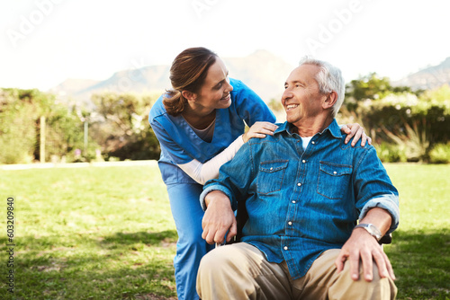 Senior man, nurse and wheelchair for life insurance, healthcare support or garden at nursing home. Happy elderly male and woman caregiver helping patient or person with a disability in the outdoors