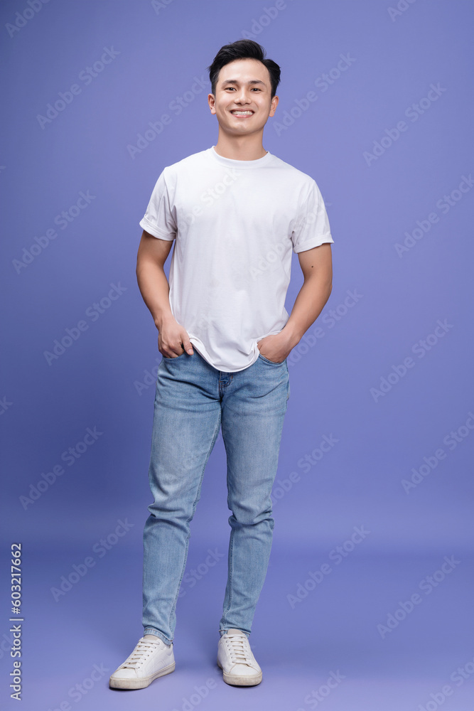 Obraz premium Photo of young Asian man on background