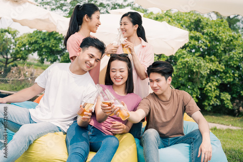 Group Asian people picnic outside