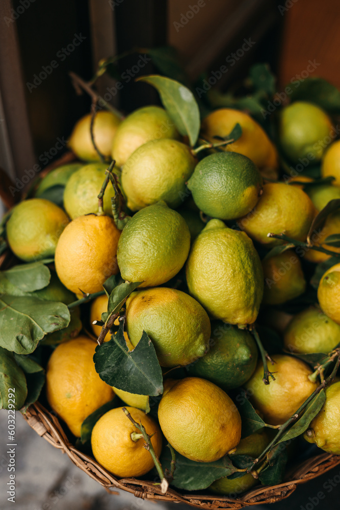 heap of lemons on a market
