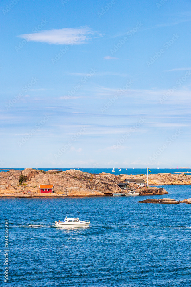 Boat on a rocky archipelago at summer