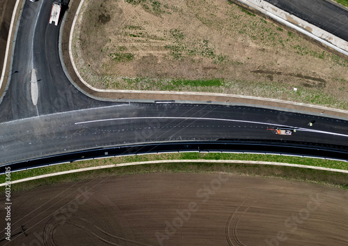 we perform horizontal road markings: central dividing lines, guide lanes, and other symbols according to the applicable road law, symbols (also atypical) according to customer requirements, parking  © Michal