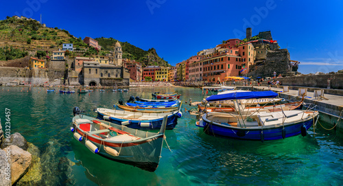 Mediterranean Sea with colorful boats and houses in Vernazza  Cinque Terre Italy