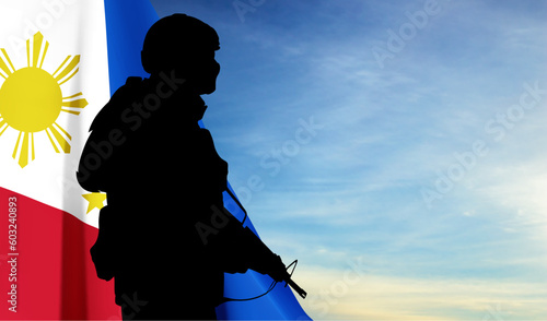 Silhouette of a soldier with Philippines flag on background of sky. Concept - Independence day. EPS10 vector