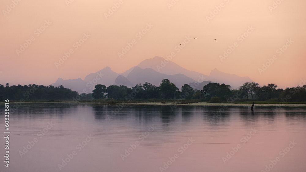 One of the many beautiful lakes in Sri Lanka at sunset.