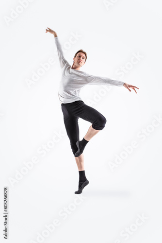 Young, handsome, sporty and athletic ballet dance. Black and white image.