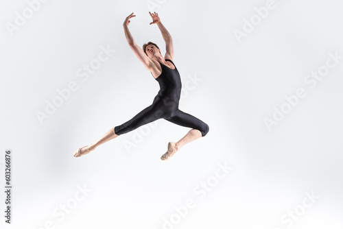 Wallpaper Mural Ballet Dancer Young Caucasian Athletic Man in Black Suit Posing Dancing in Studio On White. Torontodigital.ca