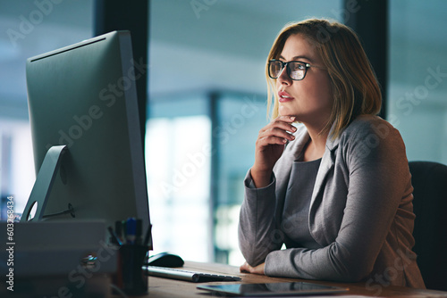 Computer, problem solving and business woman in office working late on project at night alone. Desktop, professional and female person thinking, focus or solution, planning and reading on deadline.