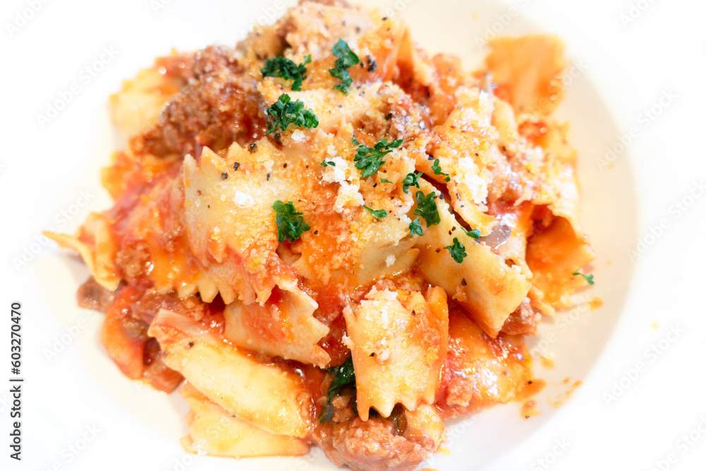Tomato sauce pasta with cheese and basil. Tomato sauce pasta with cheese and basil.