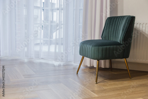 Nowoczesny zielony fotel tapicerowany