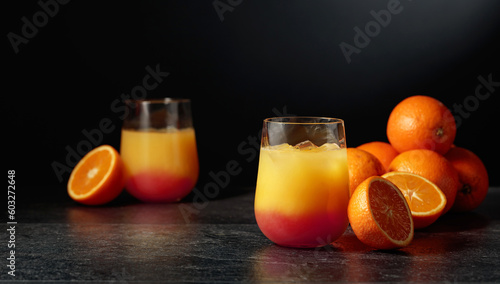 Tableau sur toile Tequila sunrise cocktail with ice and grenadine.