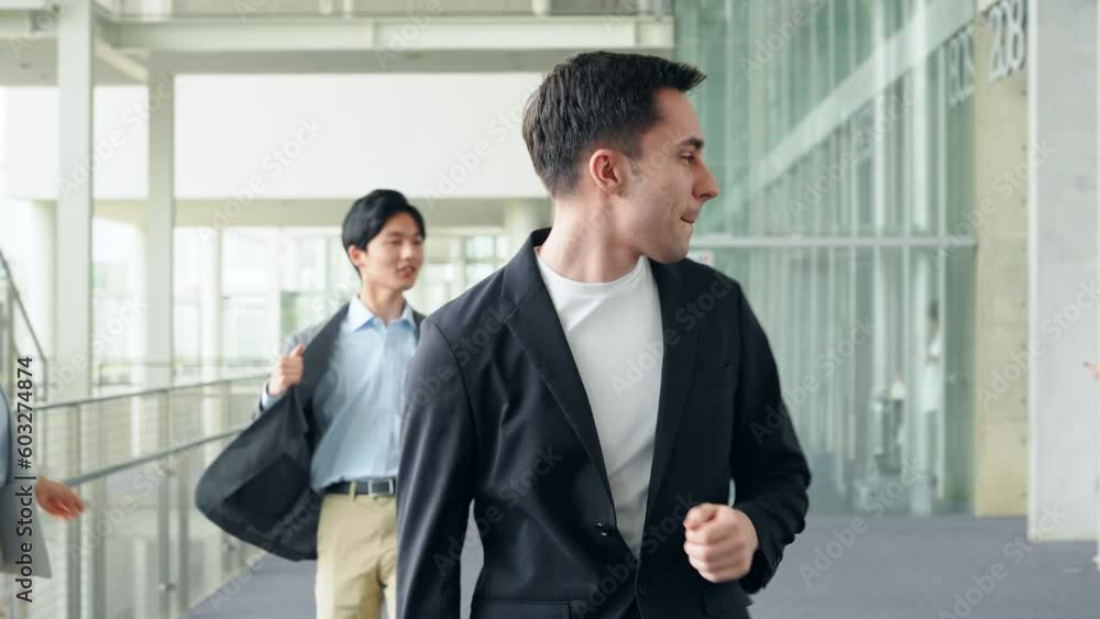 Multinational business group dancing in office. Multinational business group dancing in office.