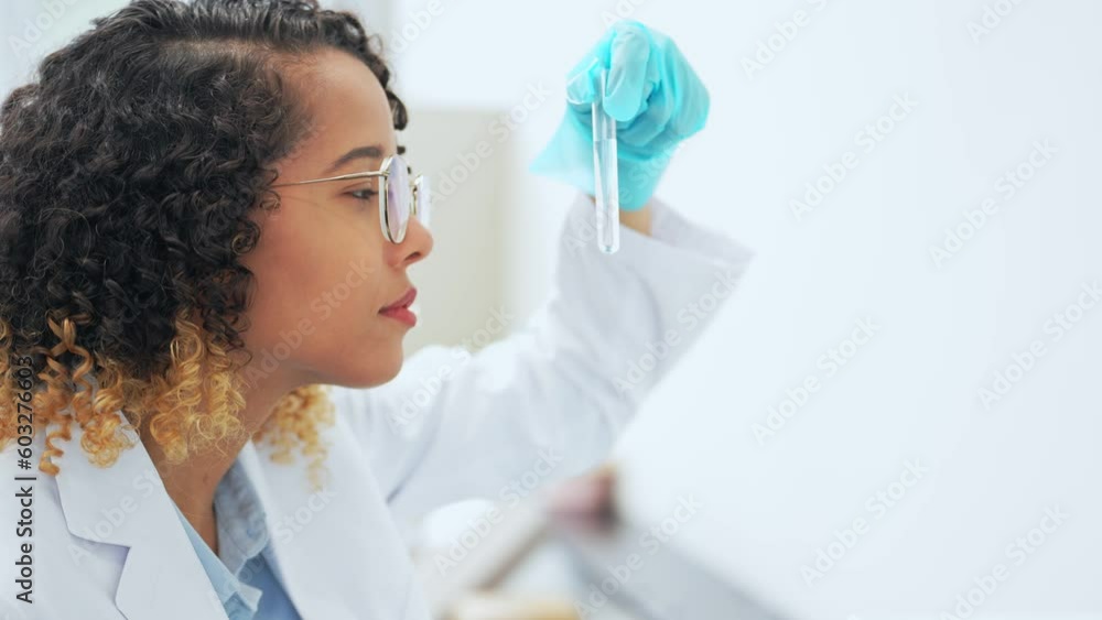 African female researcher experimenting in the lab. African female researcher experimenting in the lab.