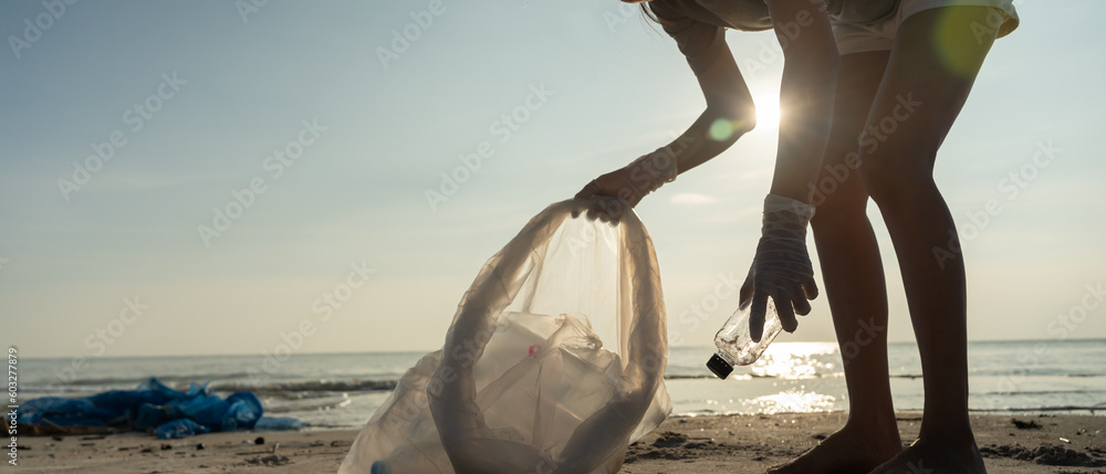 Obraz Save ocean. Volunteer pick up trash garbage at the beach and plastic bottles are difficult decompose prevent harm aquatic life. Earth, Environment, Greening planet, reduce global warming, Save world fototapeta, plakat