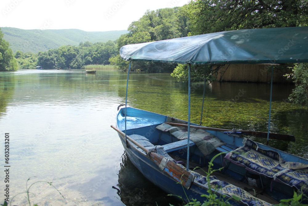 Fototapeta premium A boat on the riverside of Ohrid, Macedonia. Selective focus on the boat.