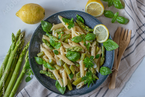 Pasta primavera with asparagus, snap peas photo