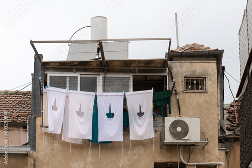 Religious garments on a laundry line photo