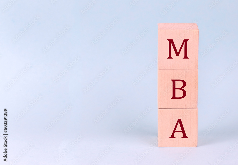 MBA on wooden cubes on a blue background MBA on wooden cubes on a blue background
