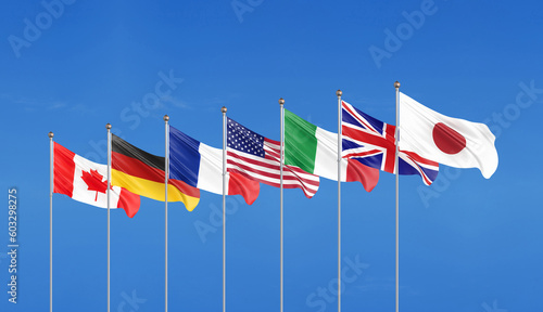 Big Seven. Flags of countries of Group of Seven Japan, Canada, Germany, Italy, France, USA , UK. The 49 th G7 Hiroshima summit on 19–21 May 2023 in the Japan. Sky background. 3D illustration. photo