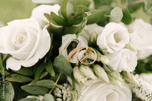 Beautiful wedding bouquet with protea and roses  wedding rings