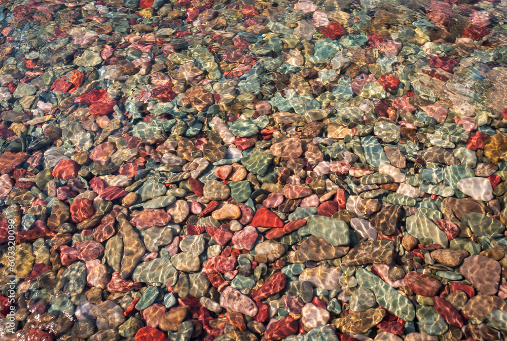 Colorful Rocks on the Coast of Saint Mary Lake in Glacier National Park Colorful Rocks on the Coast of Saint Mary Lake in Glacier National Park