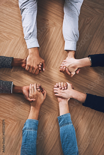 Above, diversity or business people holding hands for support, team building or teamwork in office. Partnership, zoom or employees in group collaboration with solidarity or mission for goals together