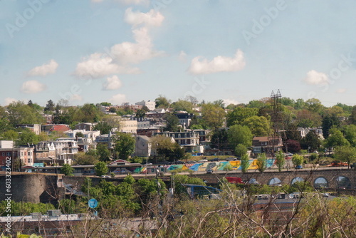 City Homes on a Hill on Sunny Spring Day photo