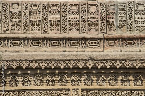 Carving details of the inner wall of Adalaj Ni Vav (Stepwell), or Rudabai Stepwell. Built in 1498 by Rana Veer Singh is intricately carved and is five stories deep. Ahmedabad, Gujarat, India photo