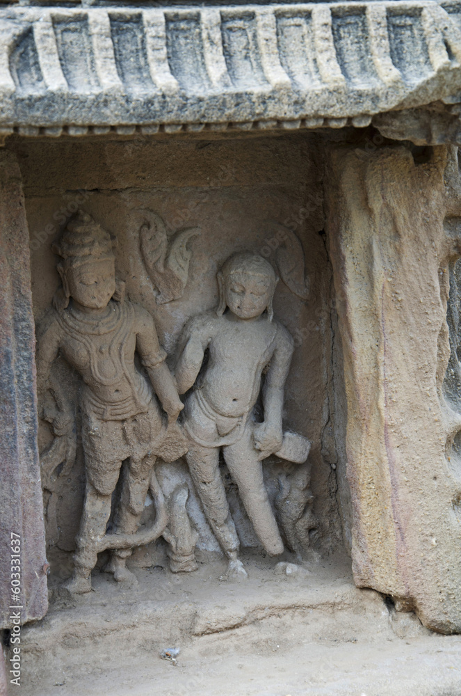 Carved idol of gods on the inner wall of a small shrine. Built in 1026 - 27 AD during the reign of Bhima I of the Chaulukya dynasty, Modhera village of Mehsana district, Gujarat, India