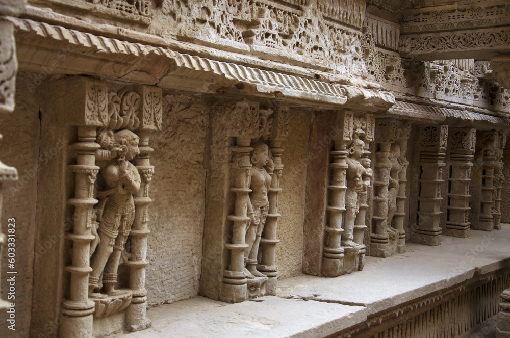 Carved idols on the inner wall and pillars of Rani ki vav, an intricately constructed stepwell on the banks of Saraswati River. Patan in Gujarat, India.