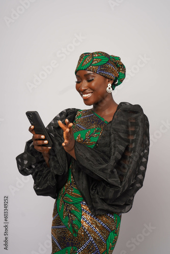 Pretty Nigerian woman using mobile phone 