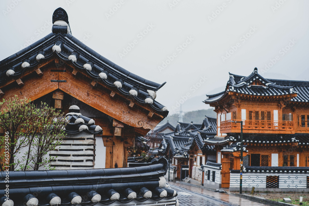Bukchon Hanok Village in Seoul, South Korea. View of traditional wooden buildings. - obrazy, fototapety, plakaty 