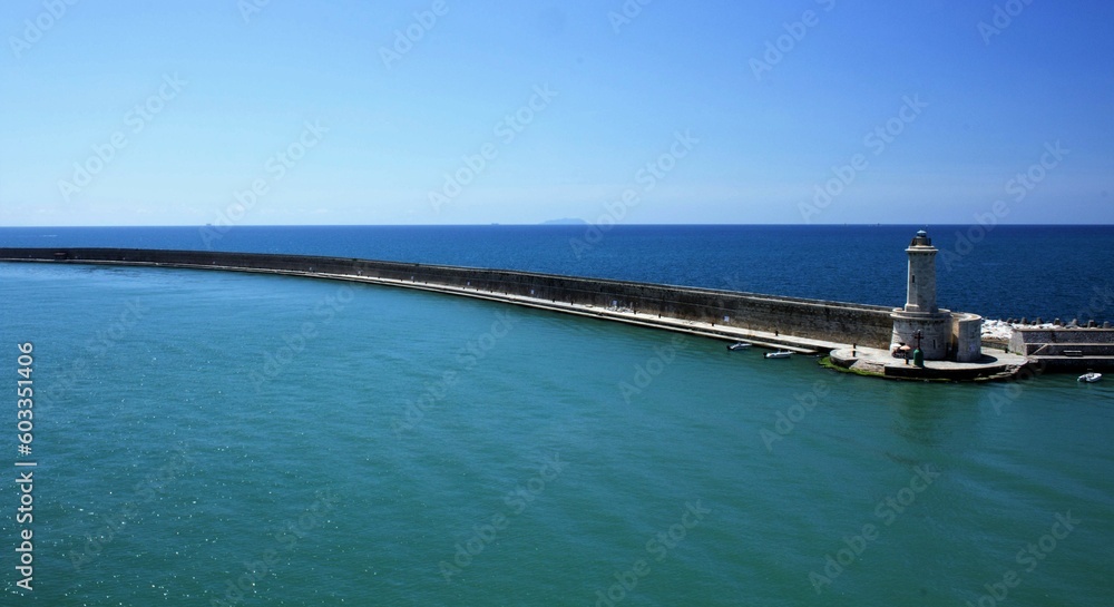 2022.07.15 Livorno, Italy, commercial port,
evocative image of the port entrance from the sea