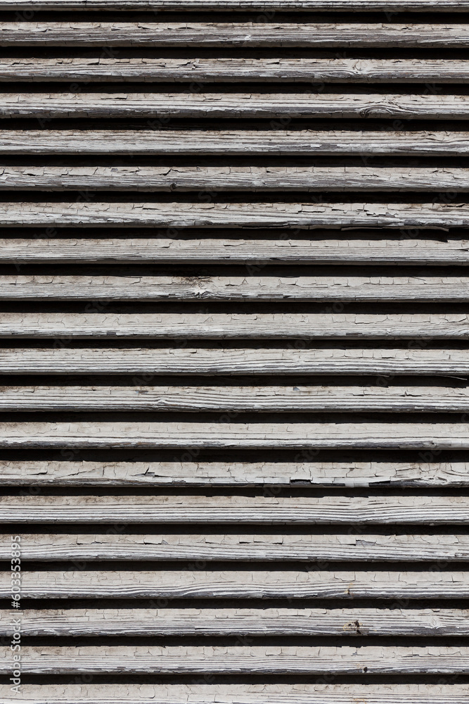 wooden shutters, covering a window or door