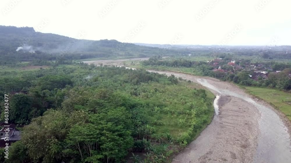 a view of rice fields and river a view of rice fields and river