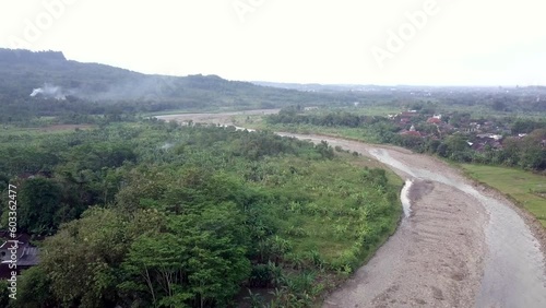 a view of rice fields and river photo