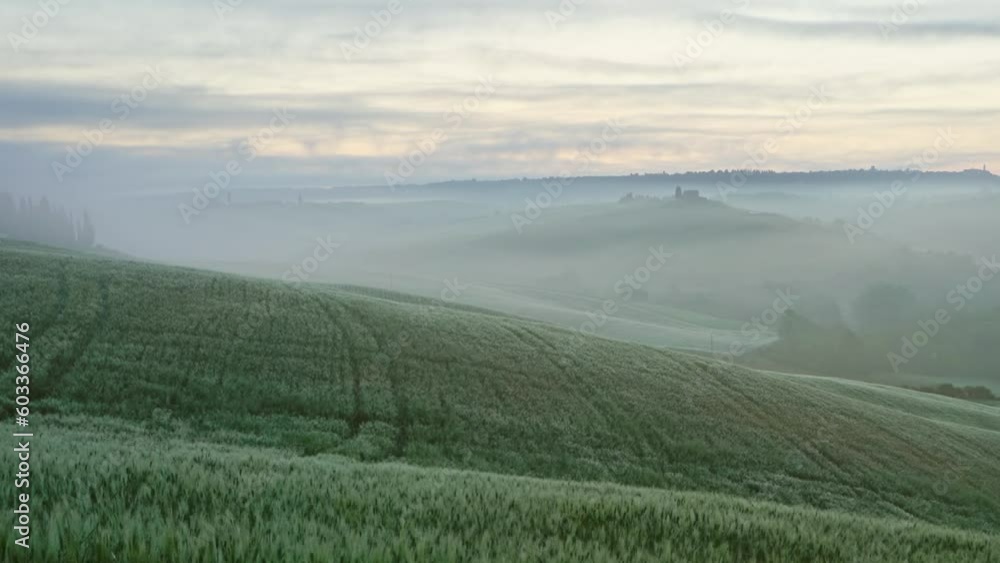 Tuscany landscape at sunrise with farm house and hills, Italy, timelapse Tuscany landscape at sunrise with farm house and hills, Italy, timelapse