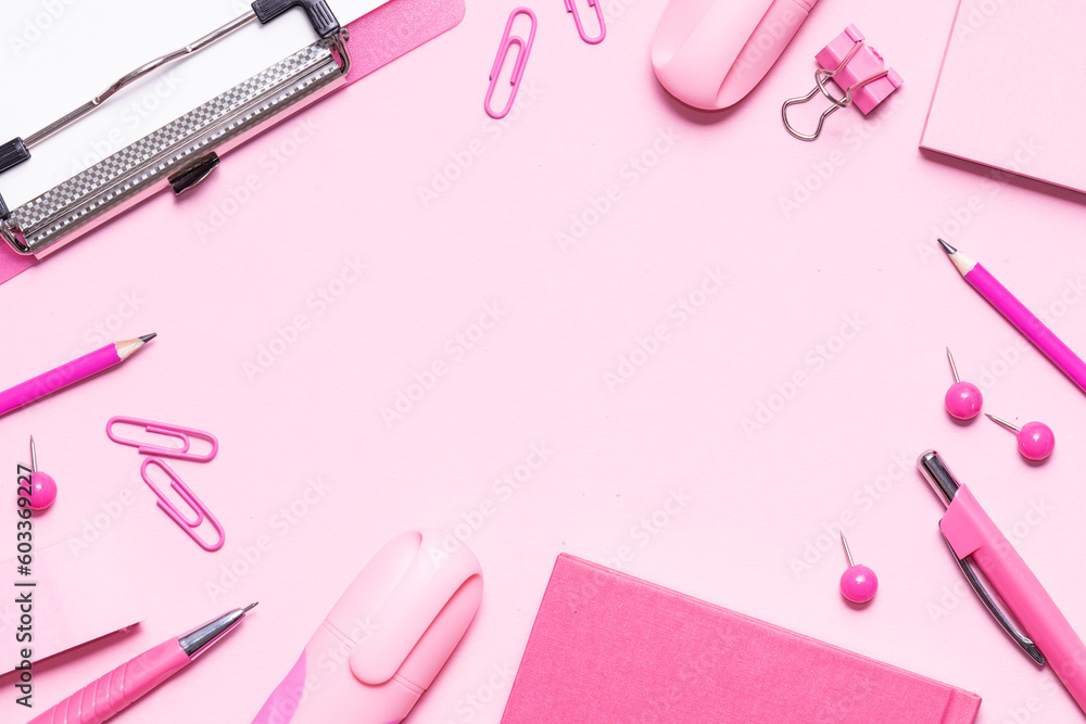 Creative office desktop with pink stationery set on pink background with copy space for your design. Creative office desktop with pink stationery set on pink background with copy space for your design.