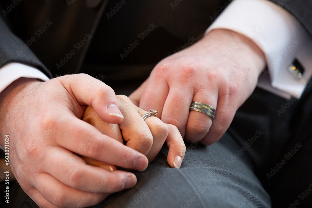 hands of the groom and bride with wedding rings hands of the groom and bride with wedding rings