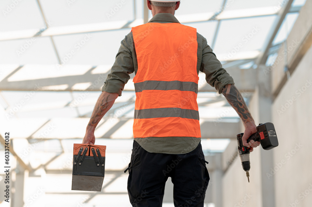 Technician ready to work at construction site. Technician ready to work at construction site.
