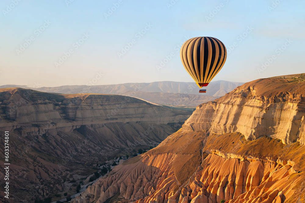 Hot air balloons flying over the Botan Canyon in TURKEY Hot air balloons flying over the Botan Canyon in TURKEY